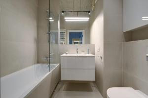 Koupelna v ubytování GO Apartments - ApartHotel