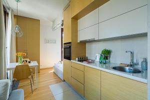 Kuchyň nebo kuchyňský kout v ubytování GO Apartments - ApartHotel