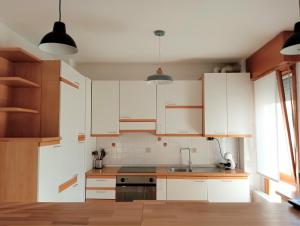 A kitchen or kitchenette at Casa Sud vicino a fiera e Pordenone centro