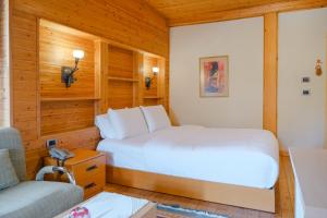 Giường trong phòng chung tại Natyral Razma Resort