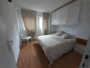 Postel nebo postele na pokoji v ubytování Calicanto Home