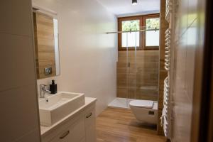Kúpeľňa v ubytovaní Apartamenty Leśne Zacisze