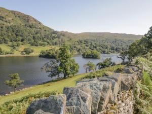 a view of a lake from a rock wall at 21 Entry Lane in Kendal