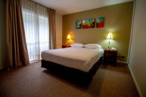 Кровать или кровати в номере Hotel Nevados de Chillan