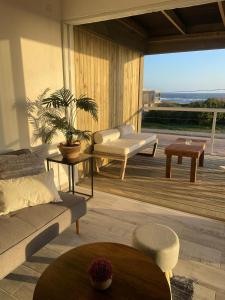 Posezení v ubytování Altamar Casas de Playa + 2 fotografie