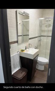 a bathroom with a sink and a shower and a toilet at Rondabella 3 Parking Gratis Centro in Ronda