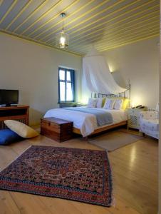 Postel nebo postele na pokoji v ubytování Kyriaki Guesthouse & Suites