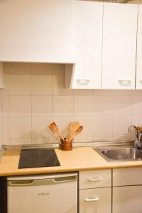 Kuchyň nebo kuchyňský kout v ubytování ESTUDIO AVET - Perfecta ubicación