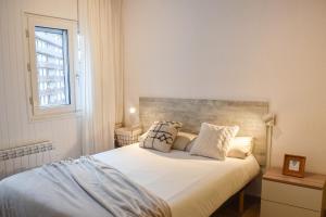 Postel nebo postele na pokoji v ubytování ESTUDIO AVET - Perfecta ubicación