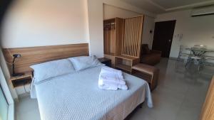 Postel nebo postele na pokoji v ubytování Práctico Smart Studio