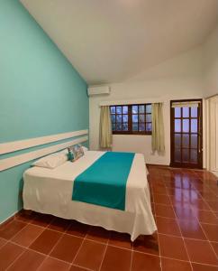 Postel nebo postele na pokoji v ubytování Calypso Beach Hotel