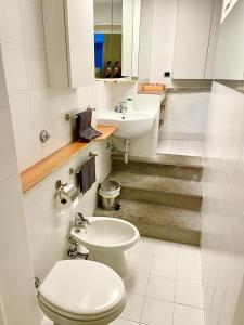A bathroom at Foro Italico, Auditorium,Ponte Milvio, Ministero degli Esteri, 'Monte Mario Hill"