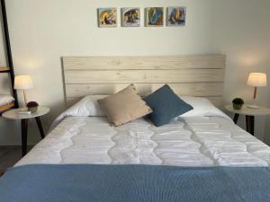 Cama o camas de una habitación en Altamar Casas de Playa