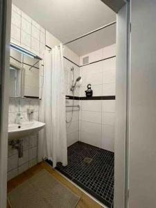 Ένα μπάνιο στο Schöne Eigentumswohnung optional mit Sauna Nutzung