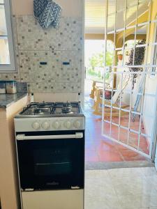 Köök või kööginurk majutusasutuses Hostal VILLAS DON PABLO LAS TABLAS