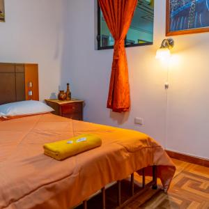 Giường trong phòng chung tại Mashy´s Hostal