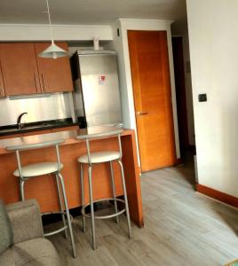 Dpto 2 habitaciones en Providenciaにあるキッチンまたは簡易キッチン