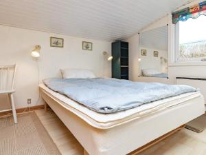 Postel nebo postele na pokoji v ubytování Holiday home Haarby IV