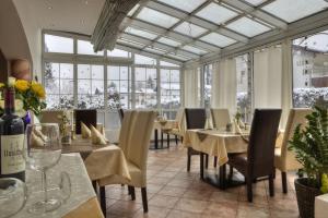 Reštaurácia alebo iné gastronomické zariadenie v ubytovaní Hotel Kögele mit Restaurant bei Innsbruck Axamer Lizum