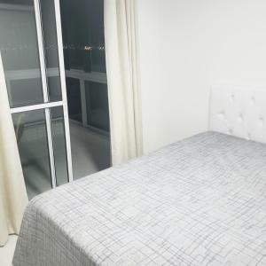Postel nebo postele na pokoji v ubytování Vista espectacular 180° Murano Praia do Morro