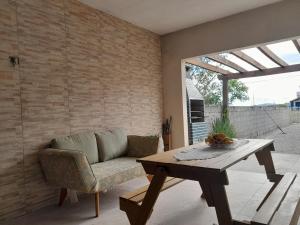 Posezení v ubytování Itapiruba 250 m da Praia - Casa Secundária - Fundos