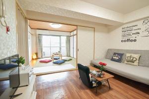 Voodi või voodid majutusasutuse 新宿市中心日式样式公寓，紧邻商业地域韩国街免费Wi-Fi toas