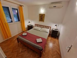 Postel nebo postele na pokoji v ubytování Apartment Mimice 2972a