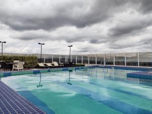 Πισίνα στο ή κοντά στο Studio Novo e Aconchegante no Centro de Guarulhos