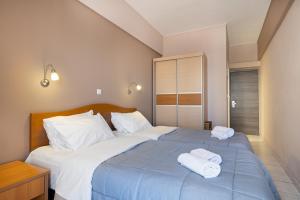 Letto o letti in una camera di Diros Hotel