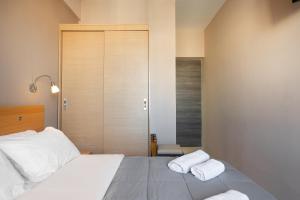Letto o letti in una camera di Diros Hotel