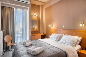 Letto o letti in una camera di Diros Hotel