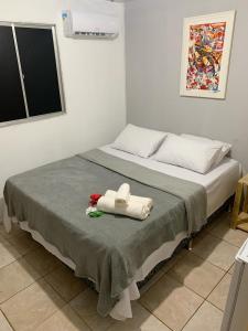 Un pat sau paturi într-o cameră la CASA MAR DE FORA