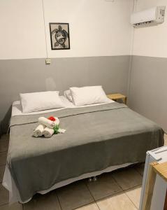 Un pat sau paturi într-o cameră la CASA MAR DE FORA