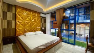 Anny Guesthouse by ecommerceloka客房内的一张或多张床位
