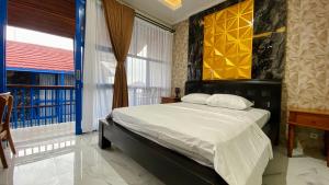 Anny Guesthouse by ecommerceloka客房内的一张或多张床位