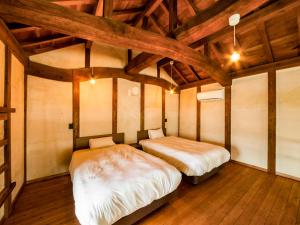 Letto o letti in una camera di NIPPONIA Chichibu Monzenmachi