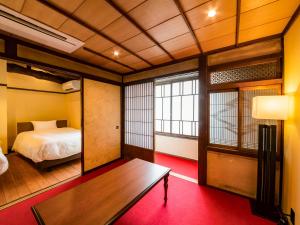 Letto o letti in una camera di NIPPONIA Chichibu Monzenmachi
