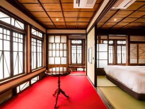 Letto o letti in una camera di NIPPONIA Chichibu Monzenmachi