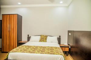 Postel nebo postele na pokoji v ubytování Hotel 61