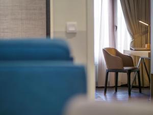 Posezení v ubytování Bahari Parade Hotel Managed by The Ascott Limited