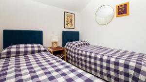 Postel nebo postele na pokoji v ubytování Apartment XXL Rio