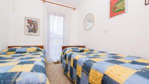 Postel nebo postele na pokoji v ubytování Apartment XXL Rio