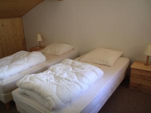 Cama ou camas em um quarto em Appartement Châtel, 4 pièces, 6 personnes - FR-1-200-295