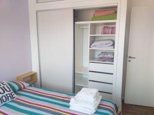 Una cama o camas en una habitación de Acogedor departamento 2 amb - Excelente ubicación