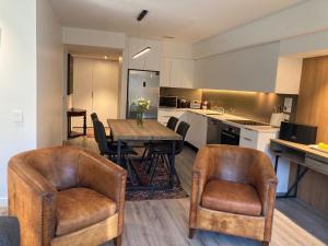 Kuchyň nebo kuchyňský kout v ubytování Garden Apartment