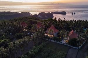 an aerial view of the resort and the ocean at Diamond Beach Villas in Nusa Penida