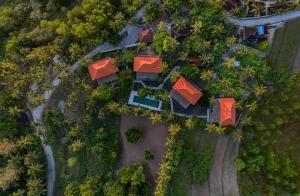 an overhead view of a house with red roofs at Diamond Beach Villas in Nusa Penida