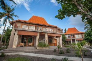 an image of a house with an orange roof at Diamond Beach Villas in Nusa Penida