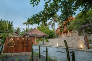 a resort with a sign that reads drinking teeth white at Diamond Beach Villas in Nusa Penida