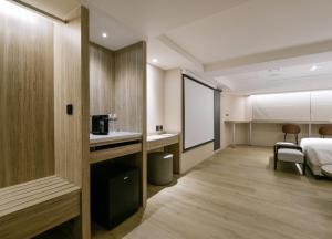 Postel nebo postele na pokoji v ubytování Spring Rhapsody Hotel + 116 fotografií